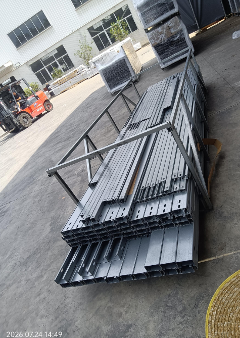 Aluminum solar mounting rails stacked and bundled at Econo Solar manufacturing facility