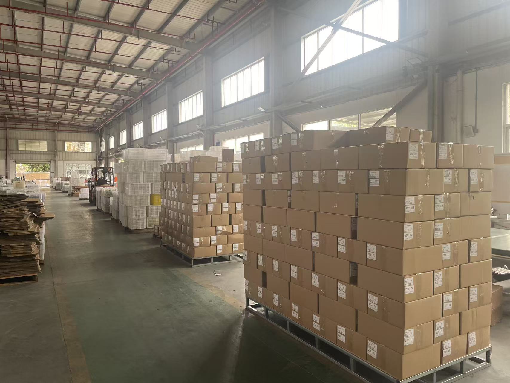 Mounting system components boxed and stacked on pallets in warehouse ready for dispatch